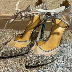 Betsey Johnson high heals, in perfect condition other then the bottoms.